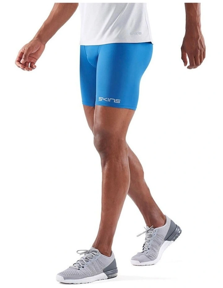 SKINS Compression DNAmic Force Half Tights 25cm In Blue 3 SKINS Compression DNAmic Force Half Tights 25cm In Blue